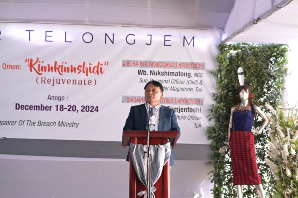 Nagaland Minister for Rural Development & SIRD, Metsubo Jamir addressing the gathering during the Asangma Shisashir Telongjem Platinum Jubilee celebration in Asangma village on December 19. (Morung Photo)